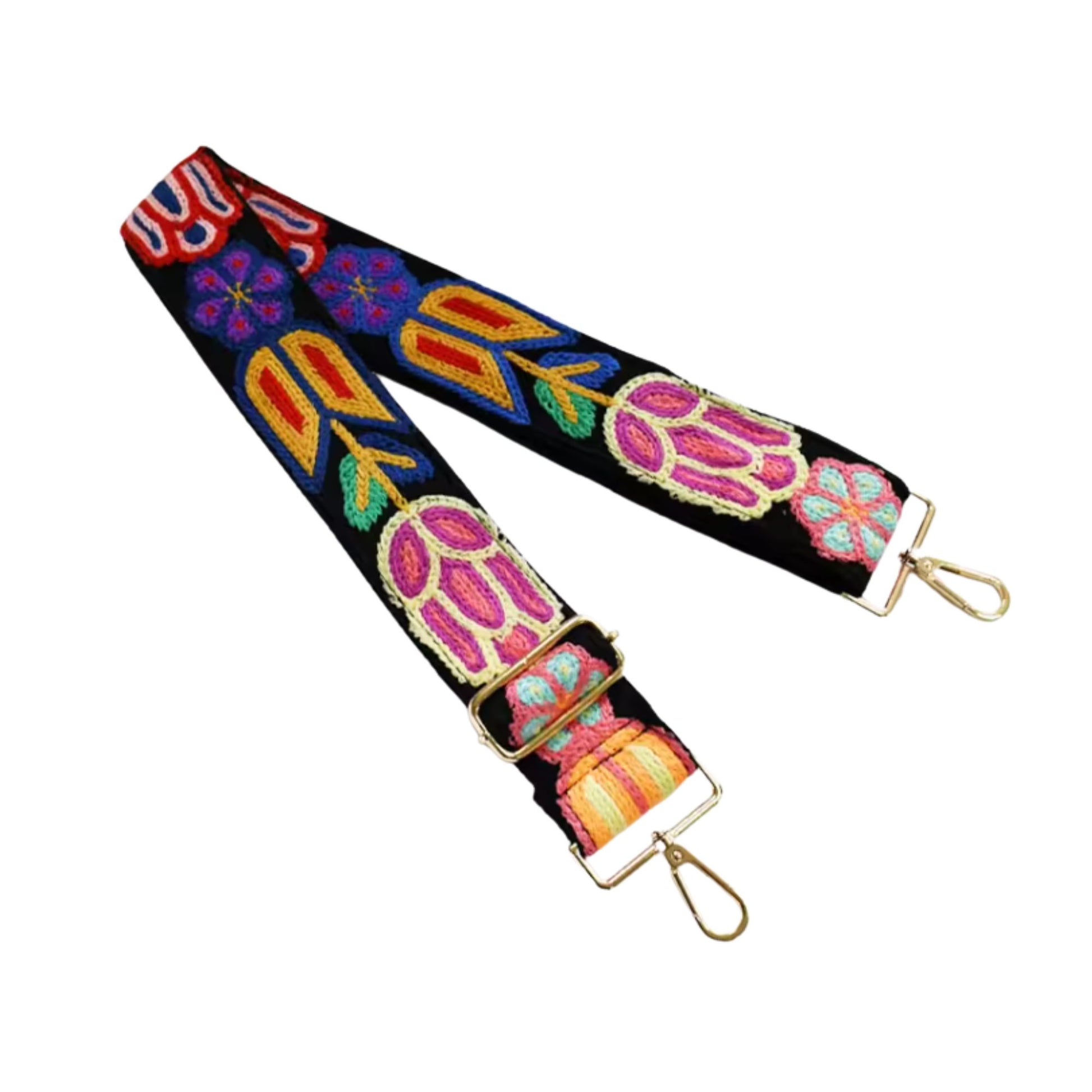 Colorful floral patterned strap with gold hardware on a white background