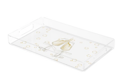 Clear acrylic tray with gold decorative elements on a white background