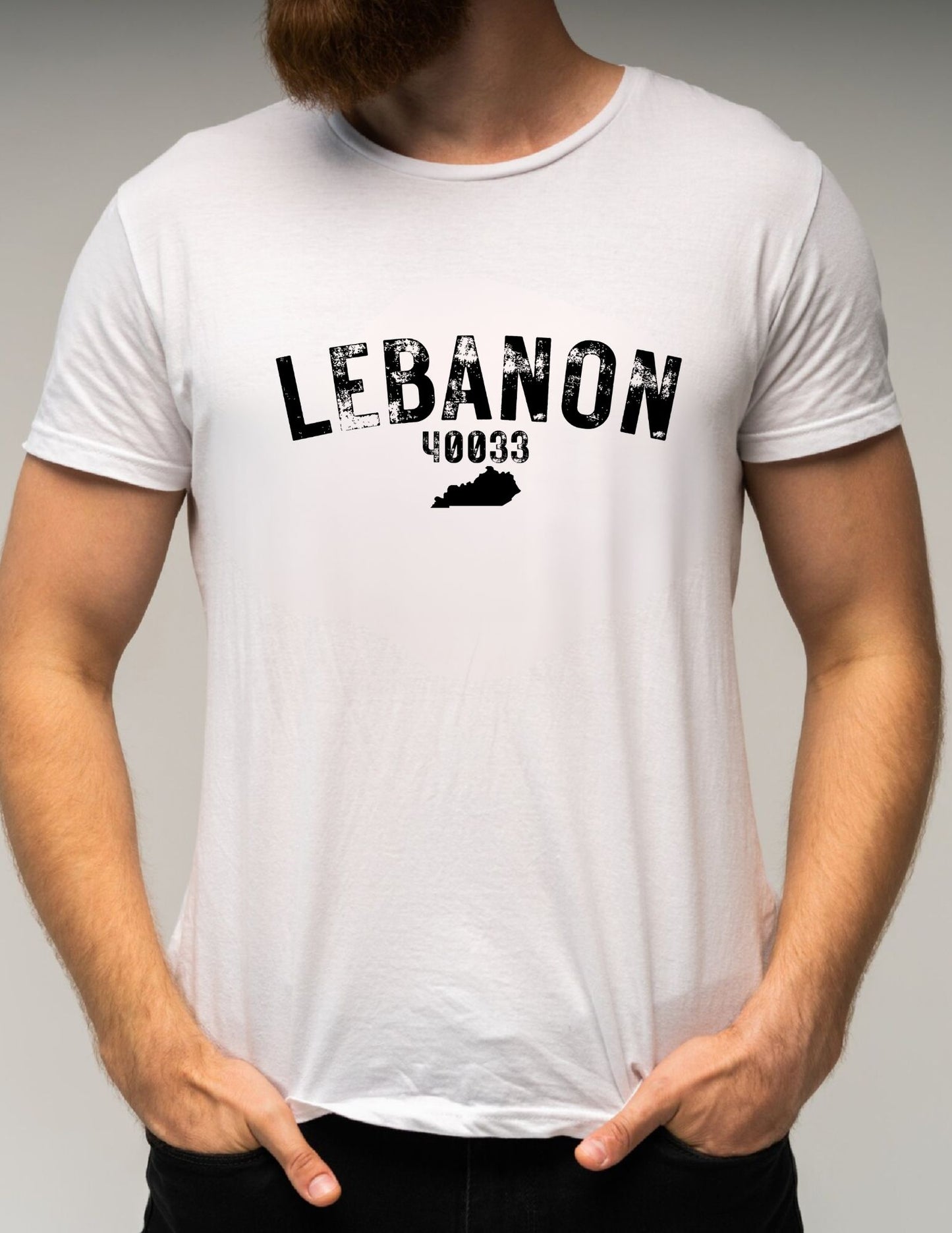 White t-shirt with 'LEBANON 40033' printed on it, worn by a person.
