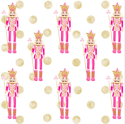 Pattern of pink nutcrackers with gold crowns on a white background