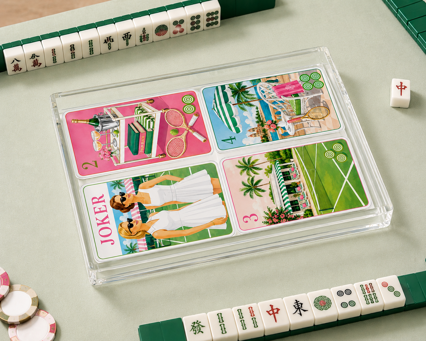 Colorful playing cards with images and text on a light green surface with tiles.