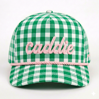Green and white checkered cap with 'Caddie' embroidery on a white background