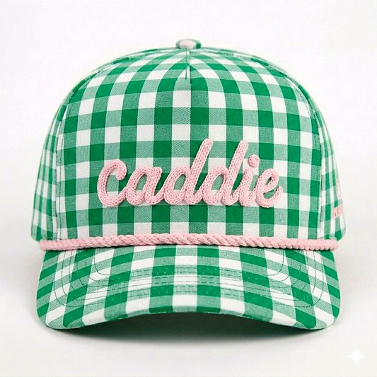 Green and white checkered cap with 'Caddie' embroidery on a white background